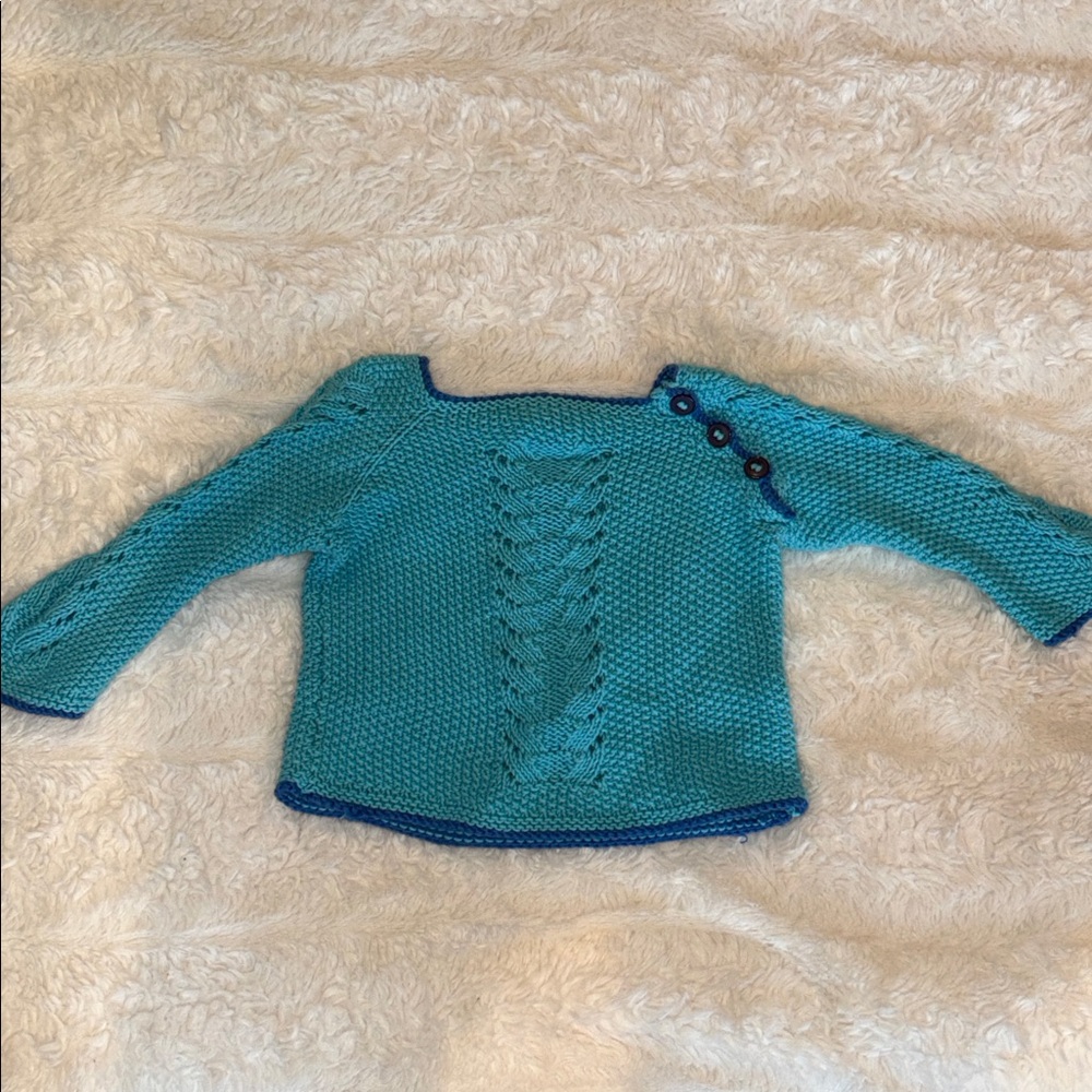 Homemade knitted toddler sweater​​